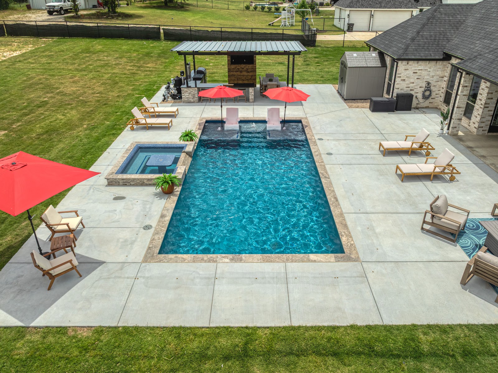 Modern Infinity Pool with Outdoor Kitchen